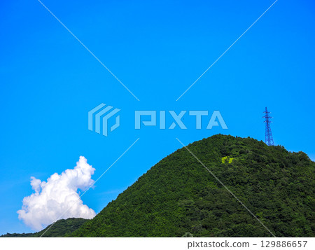 Summer blue sky and mountains Summer blue sky and mountains 129886657