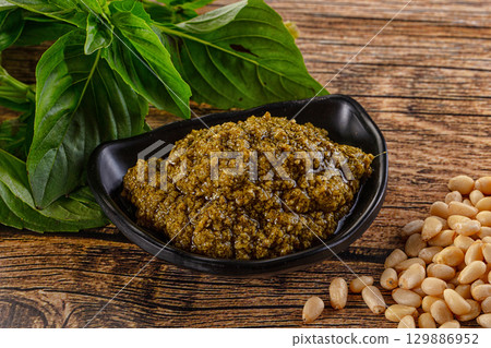 Italian Pesto sauce with basil 129886952