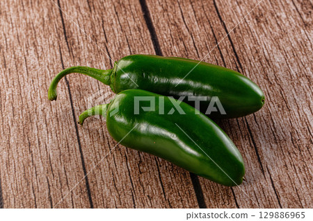 Raw ripe green jalapeno pepper Raw ripe green jalapeno pepper 129886965