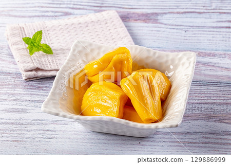 Canned sweet juicy yellow Jackfruit 129886999