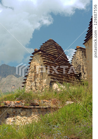 Dargavs, North Ossetia-Alania, Russia. City of the dead, ancient necropolis in the mountains of North Caucasus. 129887556