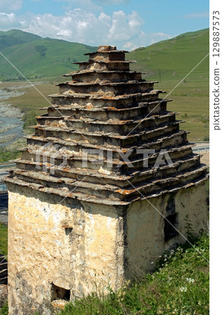 Dargavs, North Ossetia-Alania, Russia. City of the dead, ancient necropolis in the mountains of North Caucasus. 129887573