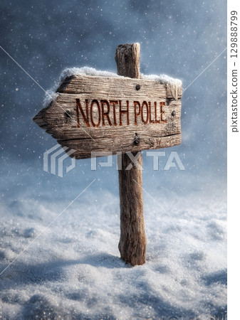 rustic wooden sign pointing to North Pole in snow 129888799