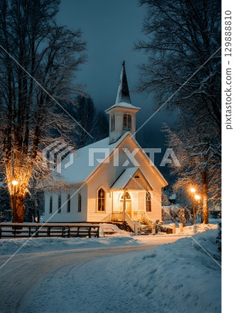peaceful church at night during snowy Christmas Eve 129888810