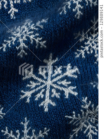 closeup of snowflakes on wool scarf closeup of snowflakes on wool scarf 129889141