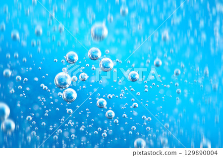 Water. Movement of air bubbles blue beautiful abstract underwater background 129890004