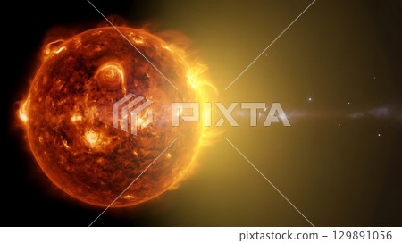 fiery sun with solar flare erupting into space against a black backdrop 129891056
