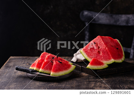 Fresh juicy sliced watermelon close up 129891601