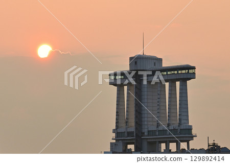 Nagoya Port Building and the rising sun 129892414
