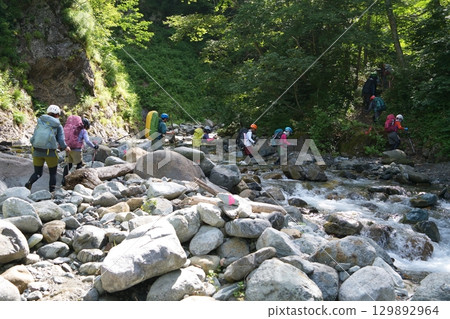 Walking along a stream Walking along a stream 129892964