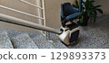 Man with walking cane on city street - mobility aid, accessible travel, urban lifestyle, disability inclusion, independence and modern streetwear fashion 129893373