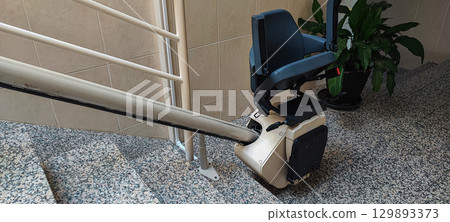 Man with walking cane on city street - mobility aid, accessible travel, urban lifestyle, disability inclusion, independence and modern streetwear fashion 129893373