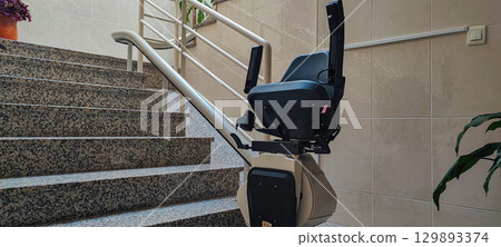 Man with walking cane on city street - mobility aid, accessible travel, urban lifestyle, disability inclusion, independence and modern streetwear fashion 129893374