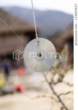 CDs hanging from a bird repellent in Ouchijuku CDs hanging from a bird repellent in Ouchijuku 129893657