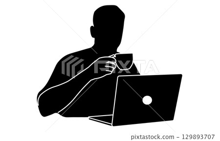 Silhouette of a man working on a laptop while drinking coffee Silhouette of a man working on a laptop while drinking coffee 129893707