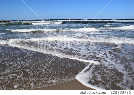 Rough waves of Shonai beach Sea of Japan Rough waves of Shonai beach Sea of Japan 129893780