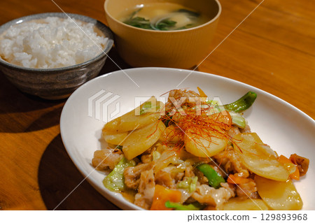 Dinner set with rice, miso soup, stir-fried pork and vegetables Dinner set with rice, miso soup, stir-fried pork and vegetables 129893968