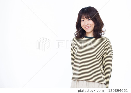 A woman wearing striped clothes A woman wearing striped clothes 129894661