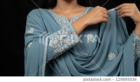 Blank salwar sleeve embroidery detail, adjusting dupatta, isolated 129895036