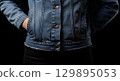 Blank denim jacket hem worn, isolated 129895053