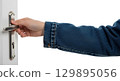 Blank denim jacket sleeve, hand opening door, isolated 129895056