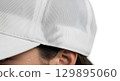 Blank cap worn with sweat stain, side view, isolated 129895060