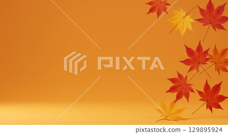 Maple leaves and orange background Maple leaves and orange background 129895924