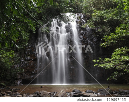 White water flowing over the rocks – the silence of Ellinjaa Falls 129897435