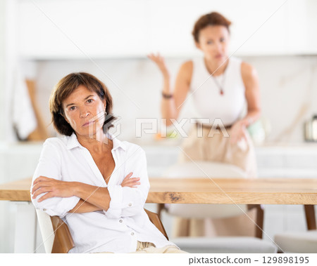 Two women sort things out during family quarrel at home 129898195