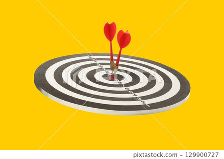Two red darts hit the target's center Two red darts hit the target's center 129900727