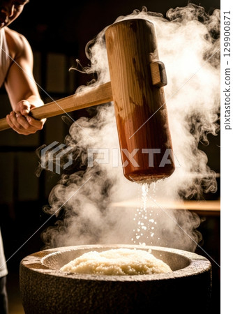 Traditional Japanese mochi pounding scene 129900871