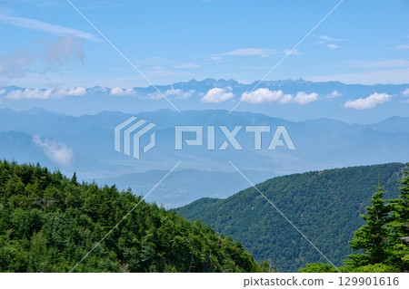 The Hotaka mountain range and Mount Yari seen from near Tomi-no-Atama on Mount Asama, on the border between Nagano and Gunma prefectures 129901616