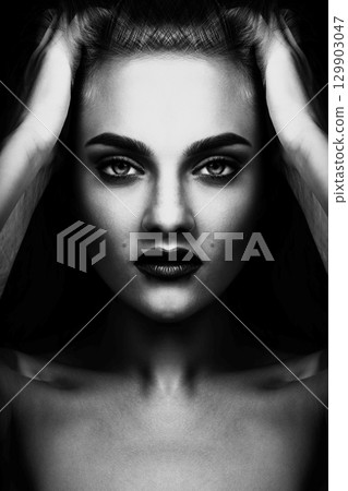 Beautiful and sexy looking woman abstract portrait in mirror blending effect style 129903047