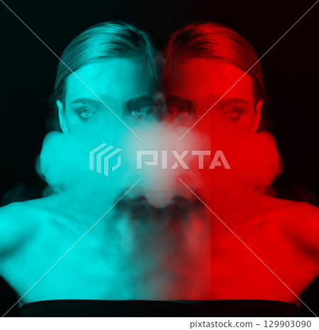 Studio portrait of beautiful woman blowing smoke from mouth in RGB color split effect style Studio portrait of beautiful woman blowing smoke from mouth in RGB color split effect style 129903090