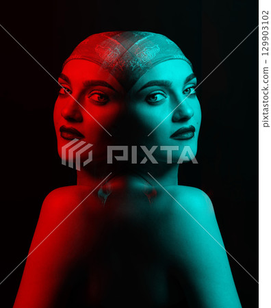 Woman with scarf on her studio portrait in RGB color split effect style 129903102