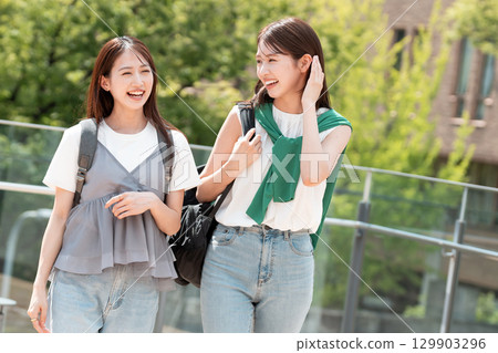 Young female university student, university campus, vocational school student 129903296