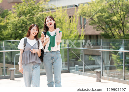 Young female university student, university campus, vocational school student Young female university student, university campus, vocational school student 129903297