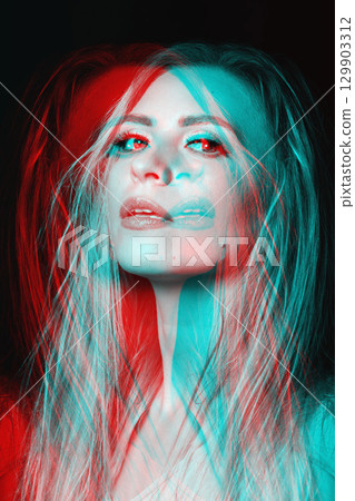 Beautiful woman with close-up studio portrait in RGB color split effect style 129903312