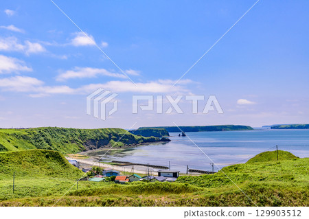 A view of Hamanaka Town and the sea under a blue sky A view of Hamanaka Town and the sea under a blue sky 129903512