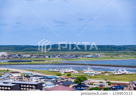 A view of Hamanaka Town and the sea under a blue sky 129903515