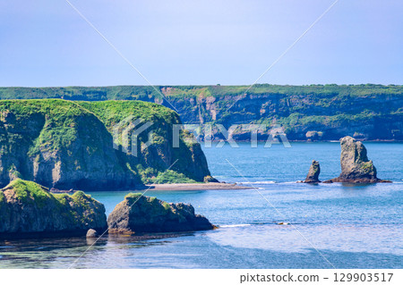 A view of Hamanaka Town and the sea under a blue sky 129903517