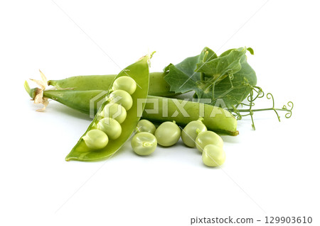 Delicious green peas, pods, and leaves isolated on a white background Delicious green peas, pods, and leaves isolated on a white background 129903610