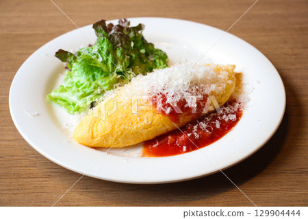 Omelette with cheese 129904444