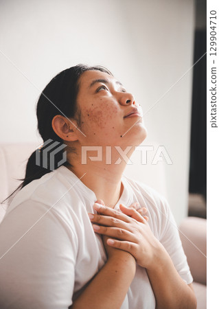 Hope and trust with crisis concept. Closeup, love and holding hands for support, comfort and care with grief, loss and empathy. people and family with compassion, sympathy and healing with bonding. 129904710