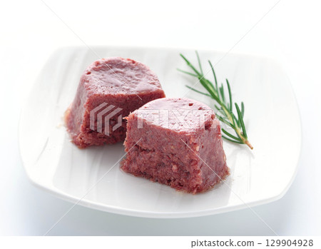 Corned beef served on a white plate - a food image that enhances the texture and appetite Corned beef served on a white plate - a food image that enhances the texture and appetite 129904928