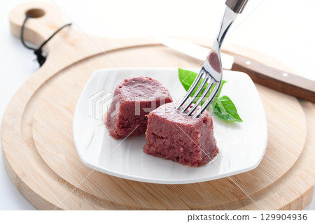 Corned beef served on a white plate - a food image that enhances the texture and appetite Corned beef served on a white plate - a food image that enhances the texture and appetite 129904936