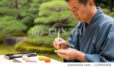 Traditional nerikiri made by a skilled male Japanese confectioner 129905608