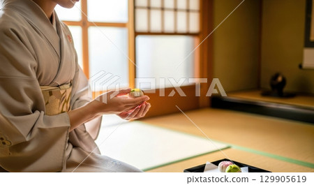 Enjoy elegant Japanese sweets while wearing a kimono 129905619
