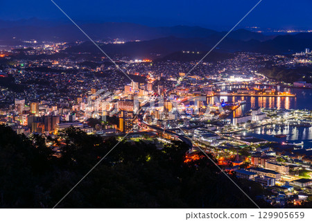 Night view of Sasebo City, Nagasaki Prefecture, and the view from Yumiharidake Observatory Night view of Sasebo City, Nagasaki Prefecture, and the view from Yumiharidake Observatory 129905659