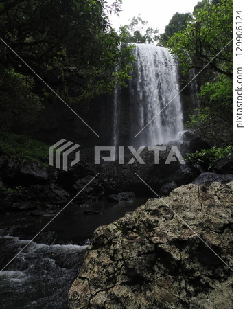 The white band hugging the rocks as it falls - the structure of Zillie Falls 129906124